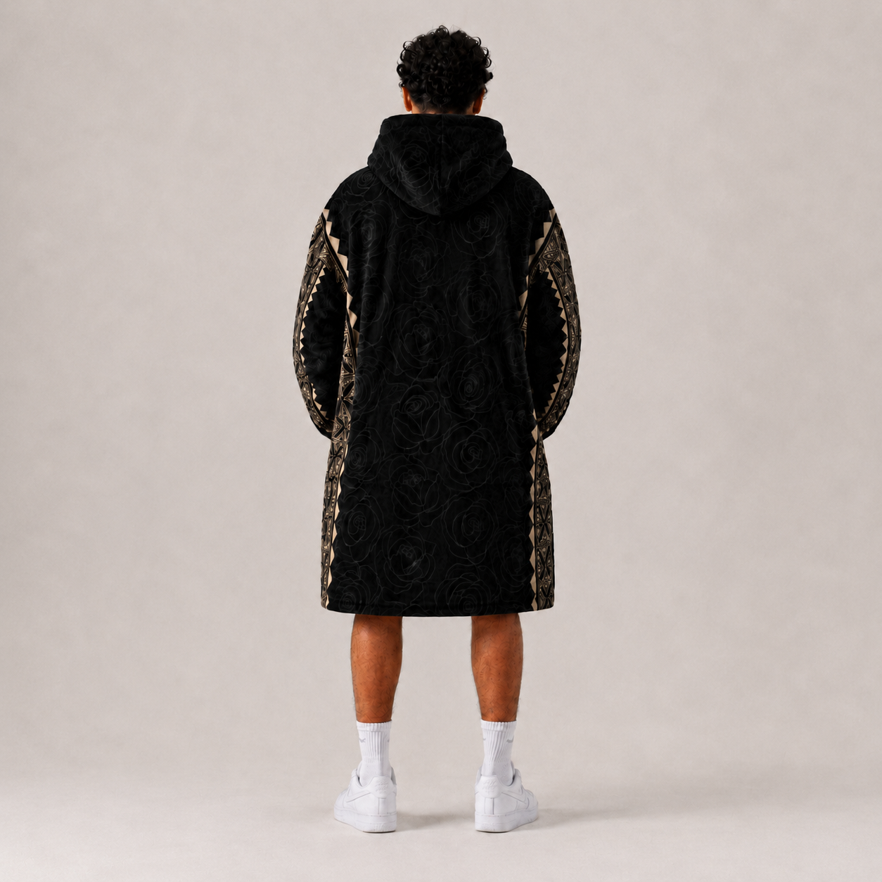 Nesian Kulture black and gold oversized snug hoodie, back view showing full garment design