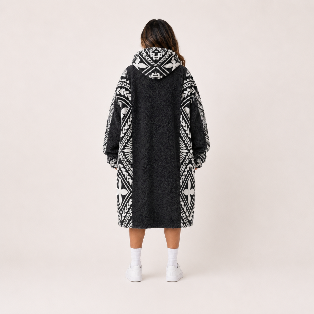 Nesian Kulture charcoal and white oversized snug hoodie, back view showing full garment design